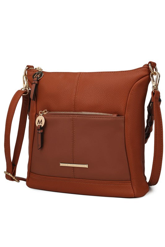 Nala vegan leather shoulder bag, warm tan exterior with brown front panel and zip top