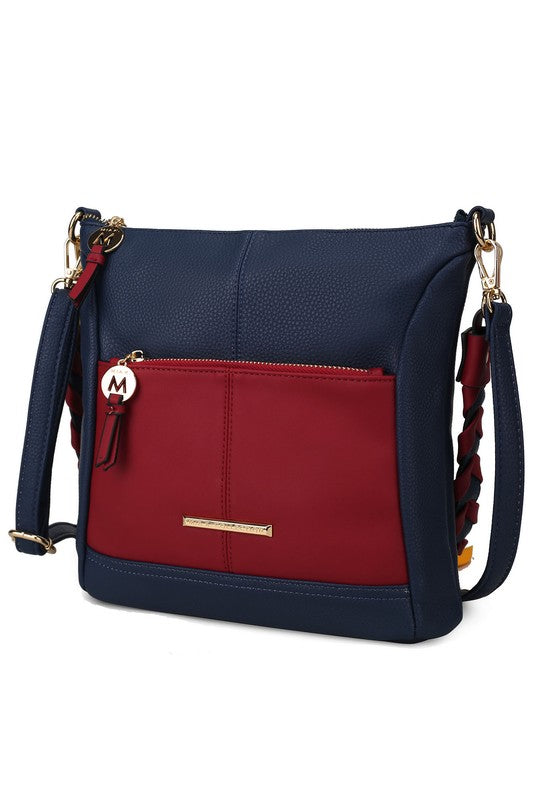 Nala vegan leather shoulder bag, navy exterior with red front panel and braided crossbody strap