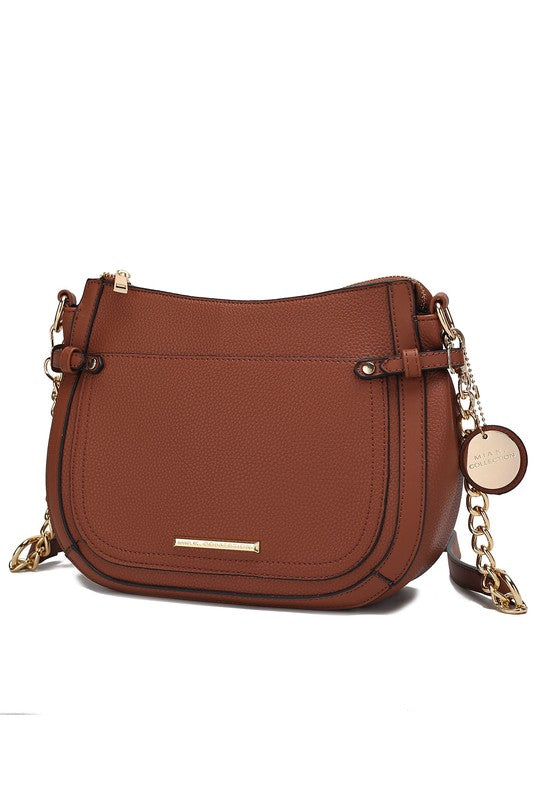 Brown Raelynn shoulder bag with gold-tone hardware, chain strap, and front flap