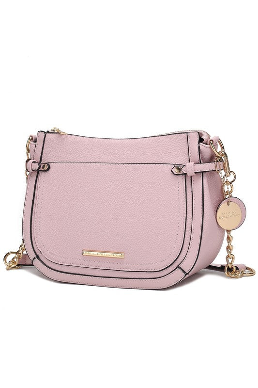 Pink Raelynn shoulder bag with front flap, chain strap, and gold-tone bar detail