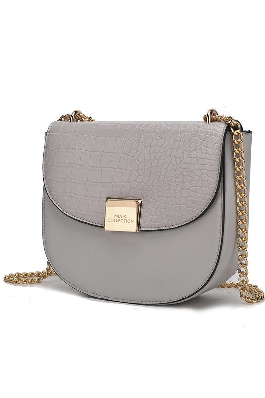 Brooklyn crossbody bag in light grey croc-texture with gold chain and flap.