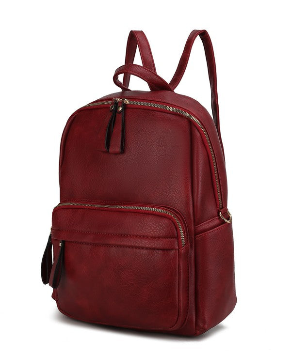 Red convertible backpack with front zip pocket and top handle straps