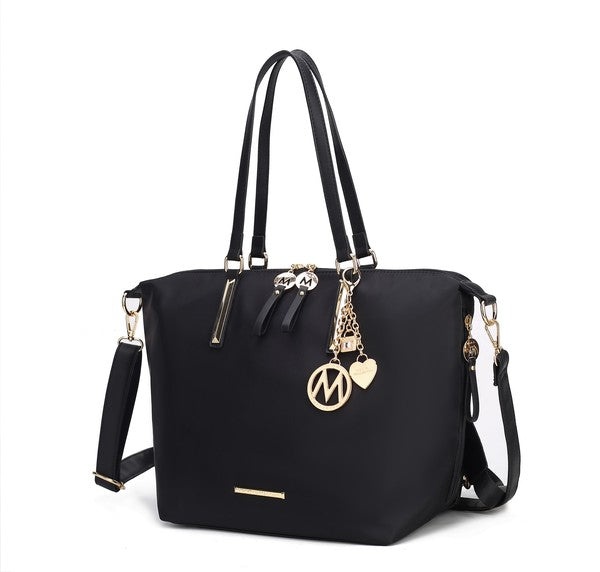 Black Layla solid tote backpack with gold-tone M charm and front zipper tab