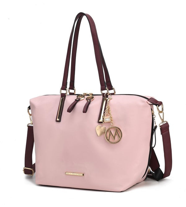 Blush pink tote backpack with burgundy straps and gold-tone M charm