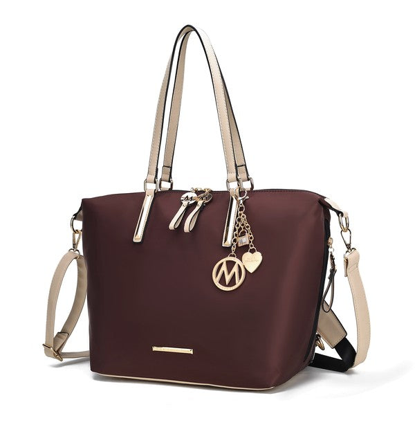 Wine-colored Layla tote backpack with light trim and gold-tone M logo charm