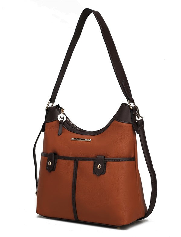 Cognac vegan leather shoulder bag with black strap accents and front center stripe panel