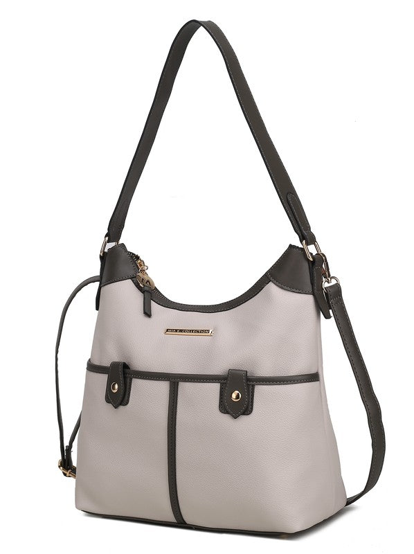 Beige vegan leather shoulder bag with dark gray trim, zip top, and front tab details