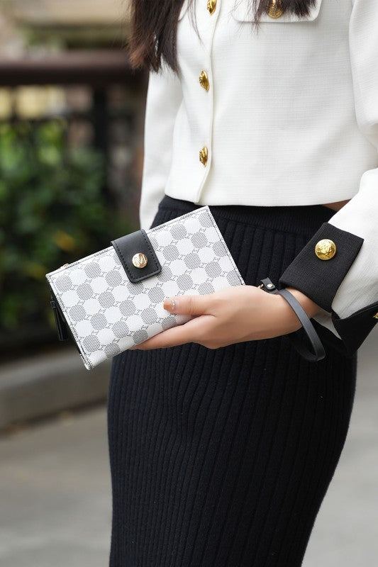 Solene wristlet wallet in charcoal patterned canvas with wrist strap and gold hardware