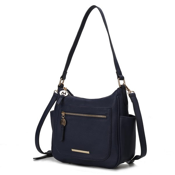 Wally shoulder bag in navy with front zip pocket, gold bar detail, and adjustable straps