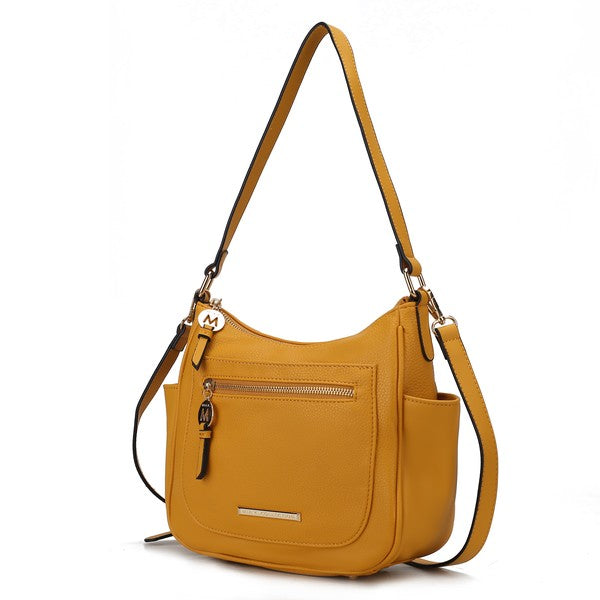 Wally handbag, mustard yellow, front zip pocket, shoulder strap with dangling logo charm.