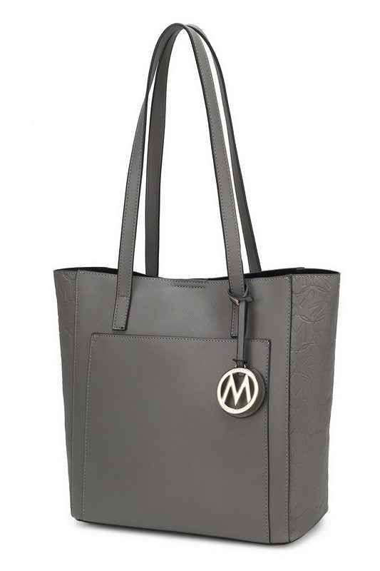 Light gray vegan leather tote with gold M logo charm and structured front organizer panel