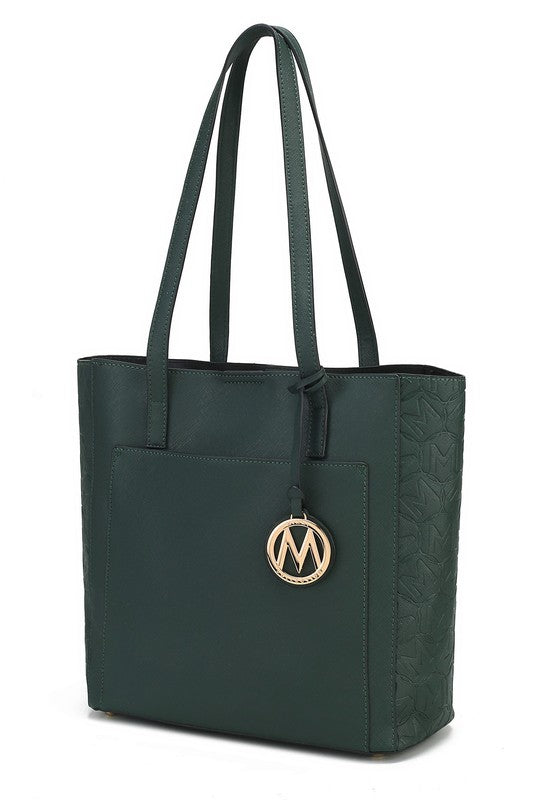 Tote in dark green vegan leather with M logo charm and structured zip-free front pocket