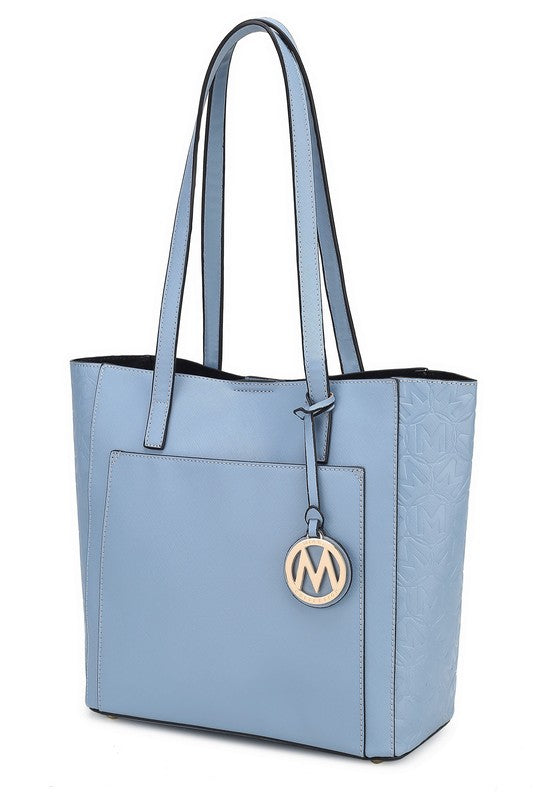 Light blue vegan leather tote with gold M logo charm and contrast inner pocket panel