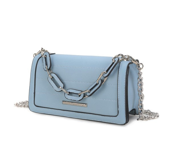 Dora crossbody bag color lavanda? no; se ve azul claro con solapa frontal y cadena