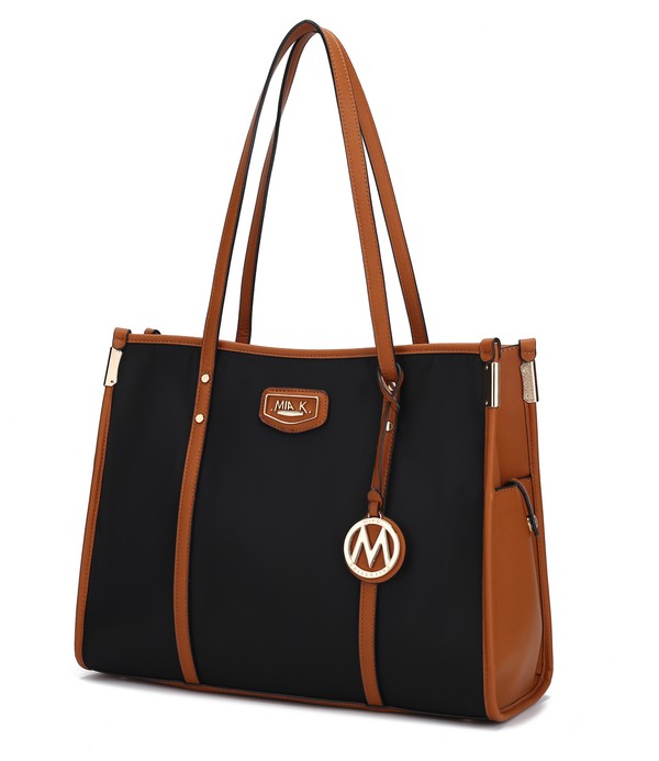 Oversize tote in black with cognac-brown trim, long handles, and M charm