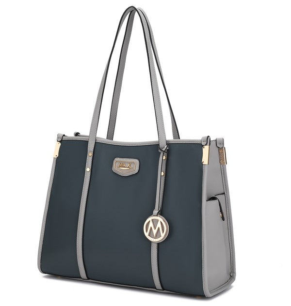 Oversize tote in charcoal with light-grey trim, long handles, and M logo charm