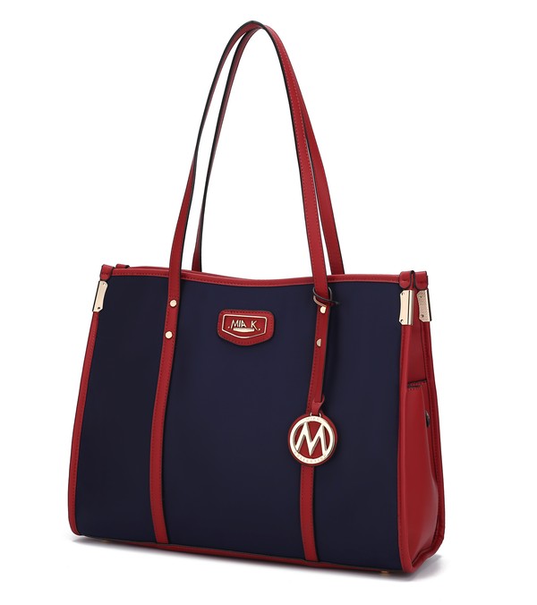 MKF Kindred oversized tote, navy body with wine-red trim, top handles and logo charm