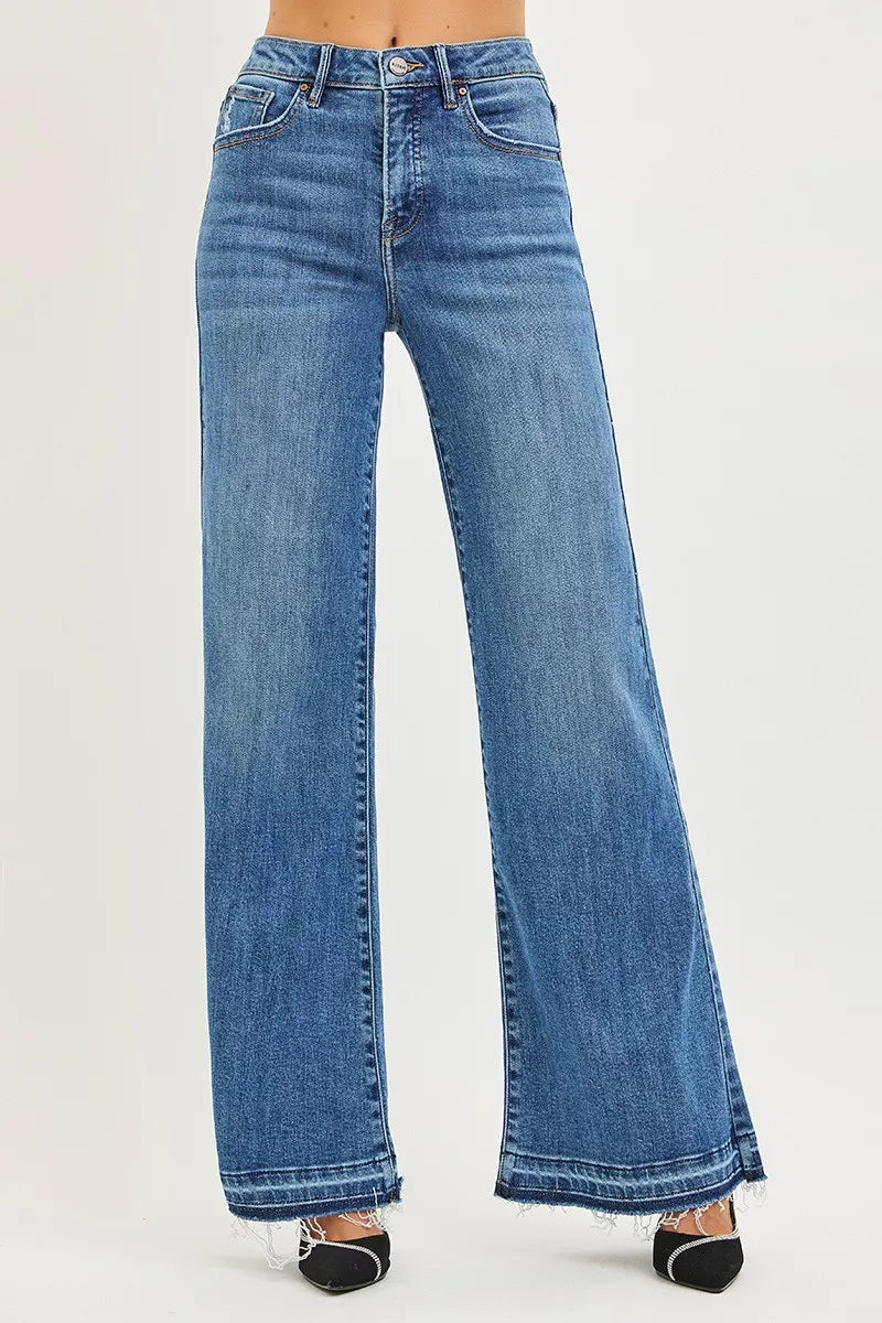 High-rise wide-leg jeans in medium blue wash, released hem