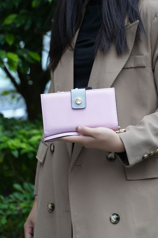 Solene vegan leather wristlet wallet in lavender-purple with snap front and gold hardware