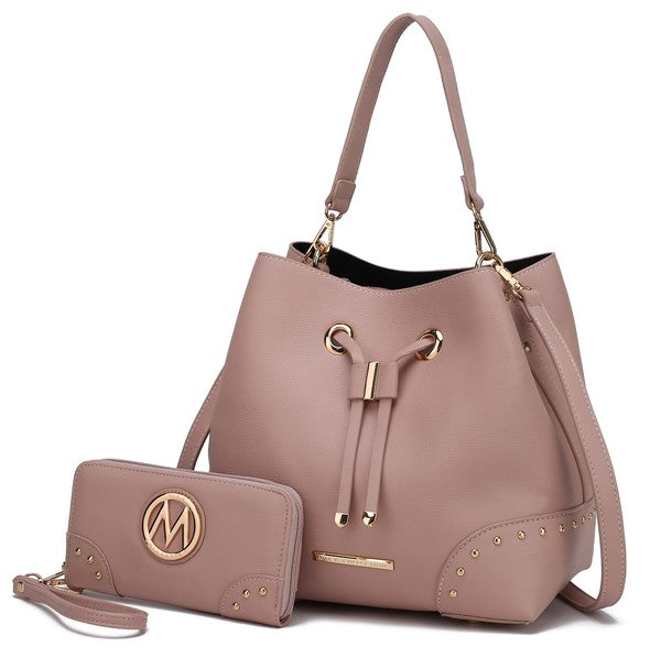 Blush pink bucket bag with drawstring closure, gold-tone eyelet hardware and wristlet