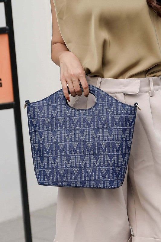 Blue mini tote with dual handles, open top cutout, and patterned logo print