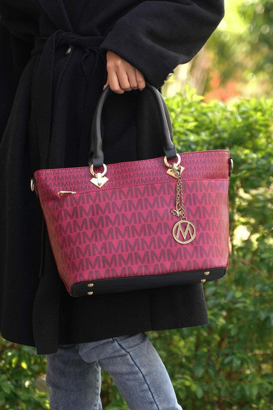 Yonah Signature tote bag in burgundy with gold logo charm, chain drop, and shoulder strap