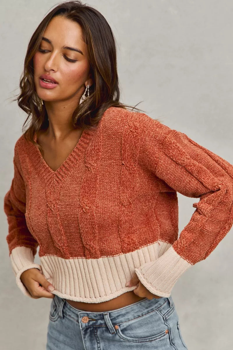 Rust chenille cable-knit V-neck cropped sweater, long sleeves, contrast cuff detail