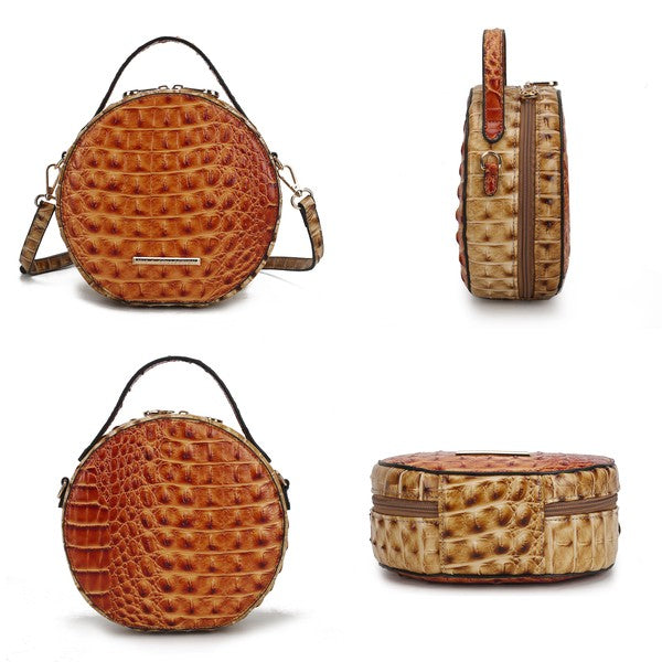 Round croc-embossed crossbody bag shown in cognac, red-brown, and tan views