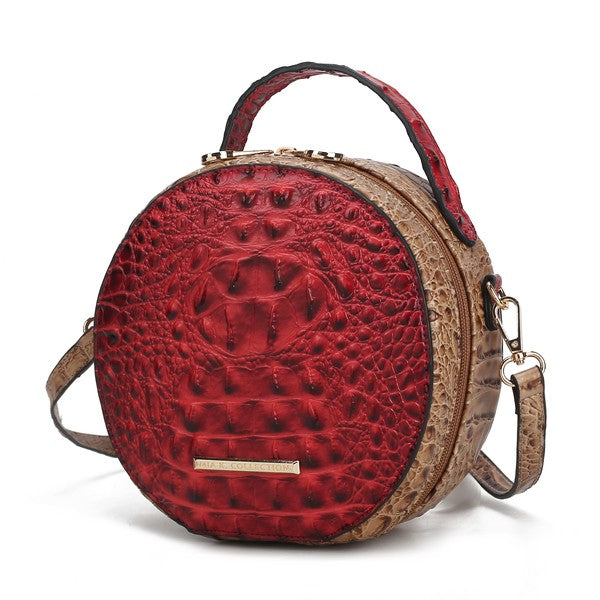 Red croc-embossed round crossbody bag with contrasting tan sides and adjustable strap