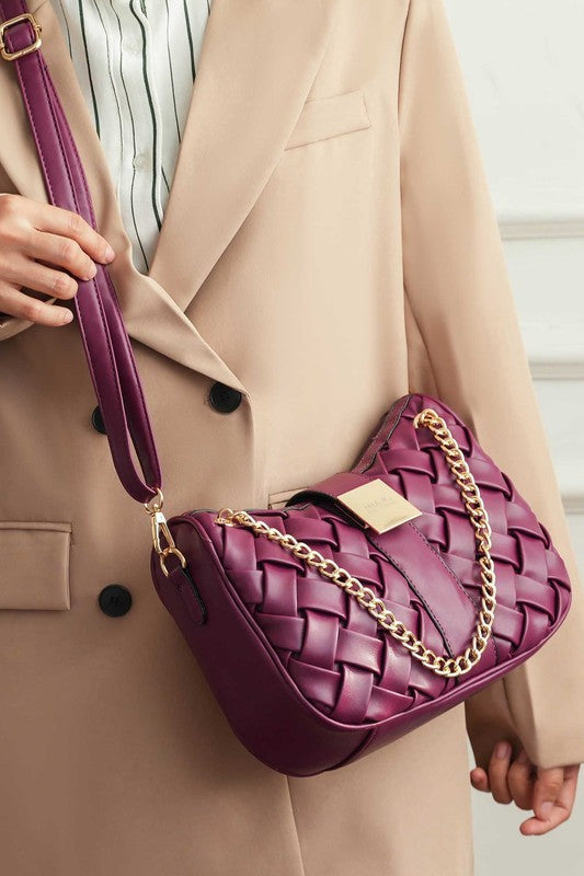 Burgundy braided chain shoulder bag with gold-tone chain strap and woven front