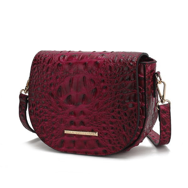 Fuchsia croc-embossed crossbody bag with front flap and short crossbody strap