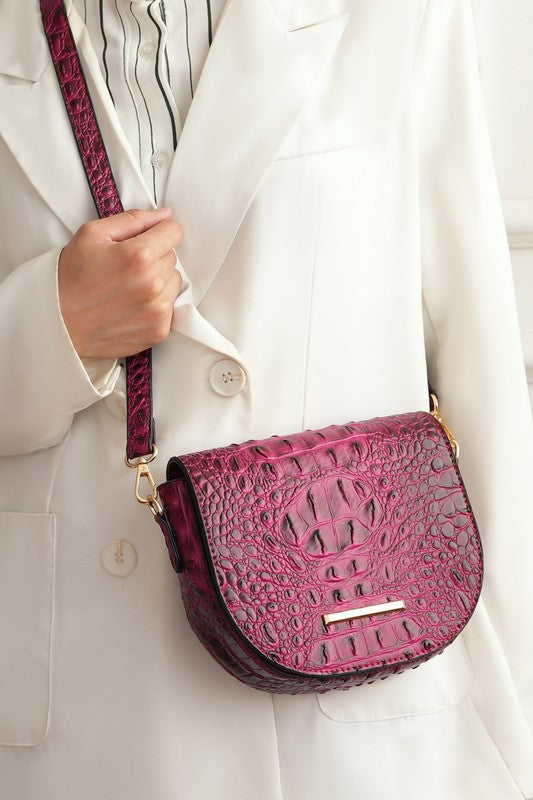 Fuchsia croc-embossed crossbody bag with flap and gold-tone hardware