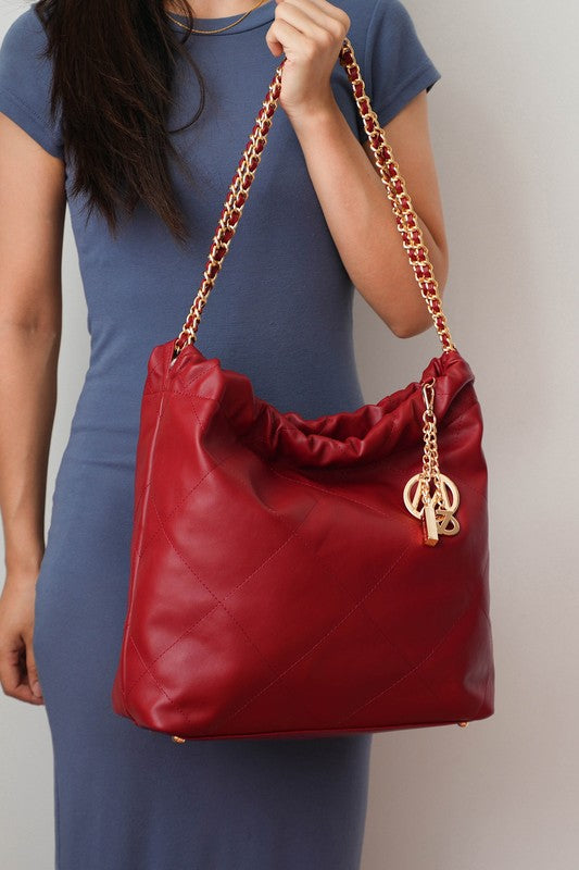 Wine quilted shoulder bag with chain strap and logo key charm