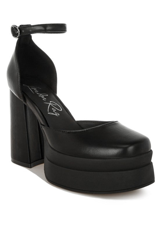Black chunky square-toe buckled heels with platform sole and thick block heel
