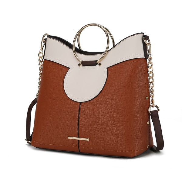 Rust brown and white top handle satchel with oval front detail and gold-tone chain.