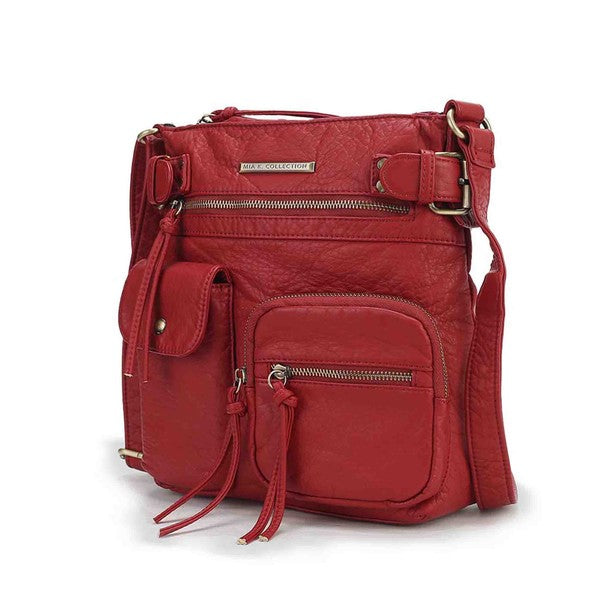 Burgundy leather-look crossbody bag with front zip pocket and adjustable strap