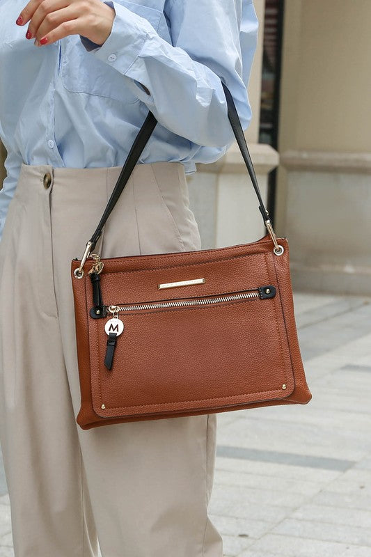 Aliyah shoulder bag in Cognac with long black strap and gold-toned front zipper