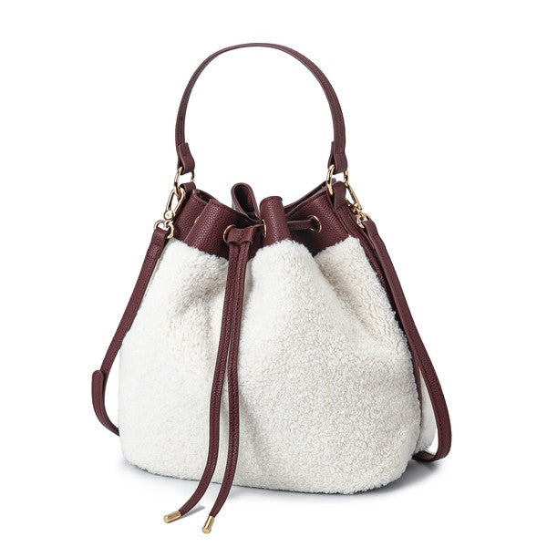 Burgundy sherpa bucket bag with drawstring top and gold-tone hardware