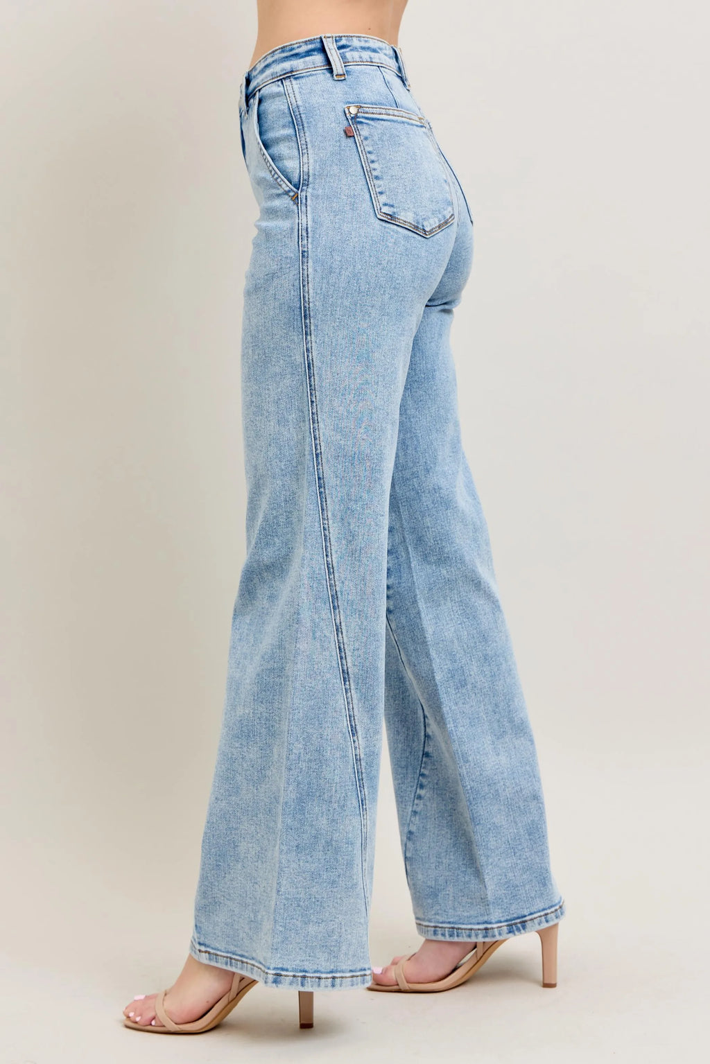 Light wash wide-leg jeans, back view with straight waistband and back pockets