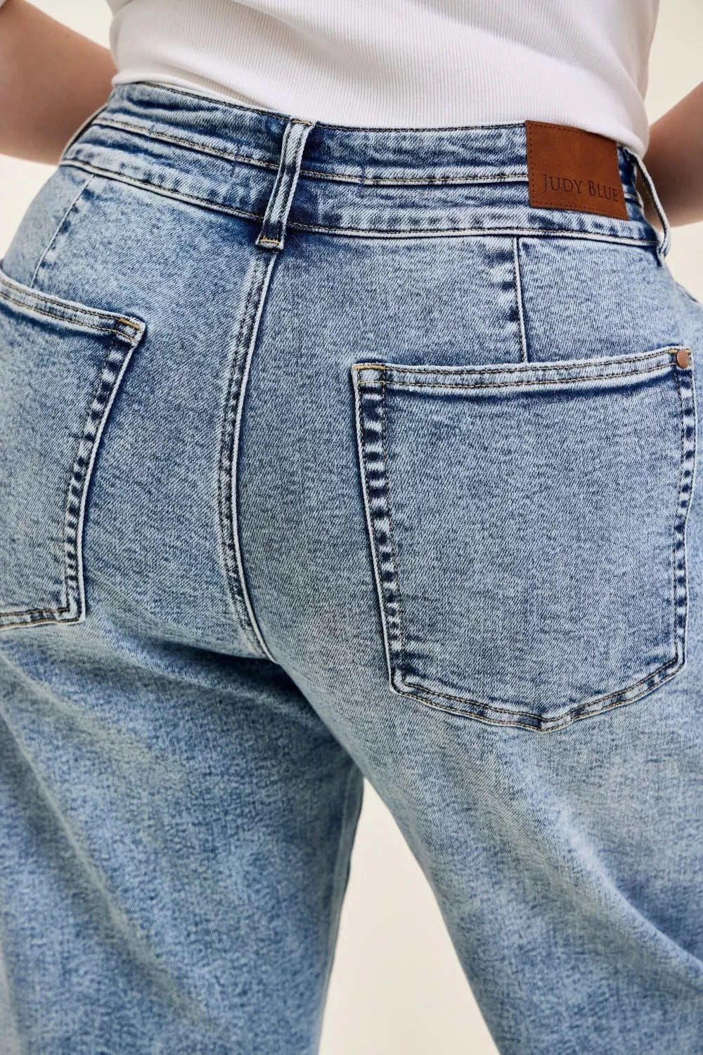 Light Blue back pockets and double waistband with logo patch detail