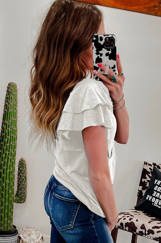 White blouse side/back view with layered ruffle sleeves and crew neck, worn