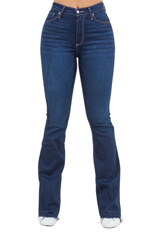 Dark wash bootcut jeans, back view, yoke seams and rear pockets
