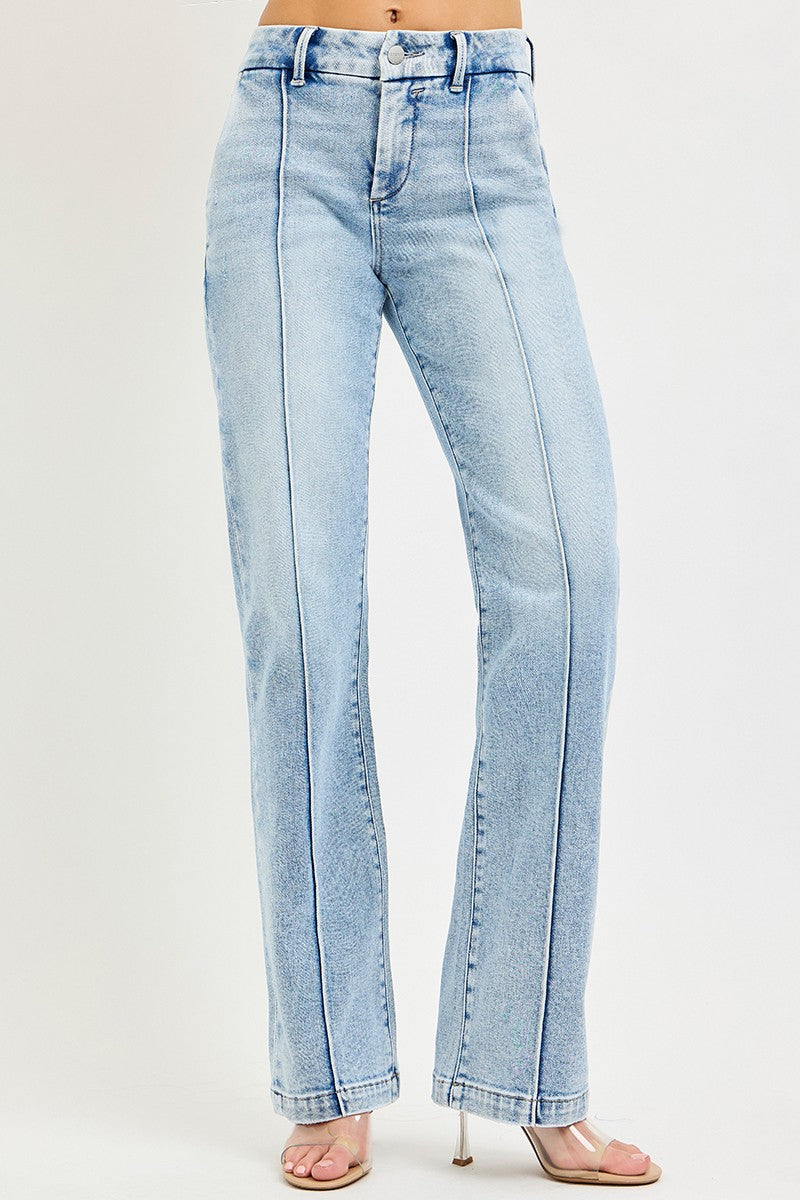 Light wash high-rise straight jeans front view: button fly, belt loops, pin-tucks