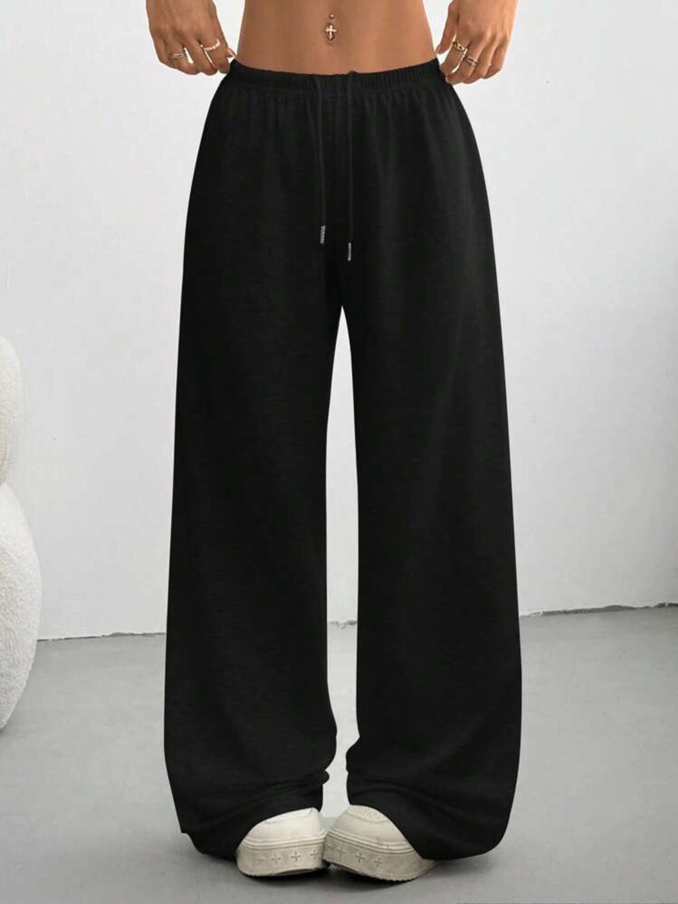 Black Relaxed Fit Drawstring Pants, wide legs with elastic waist and drawstring ties