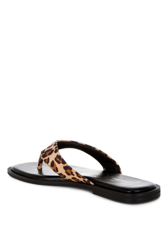Leopard print thong sandal, low flat sole, wide strap across top