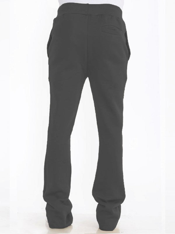 Men's solid grey track pants, rear view, drawstring waist, flare hem