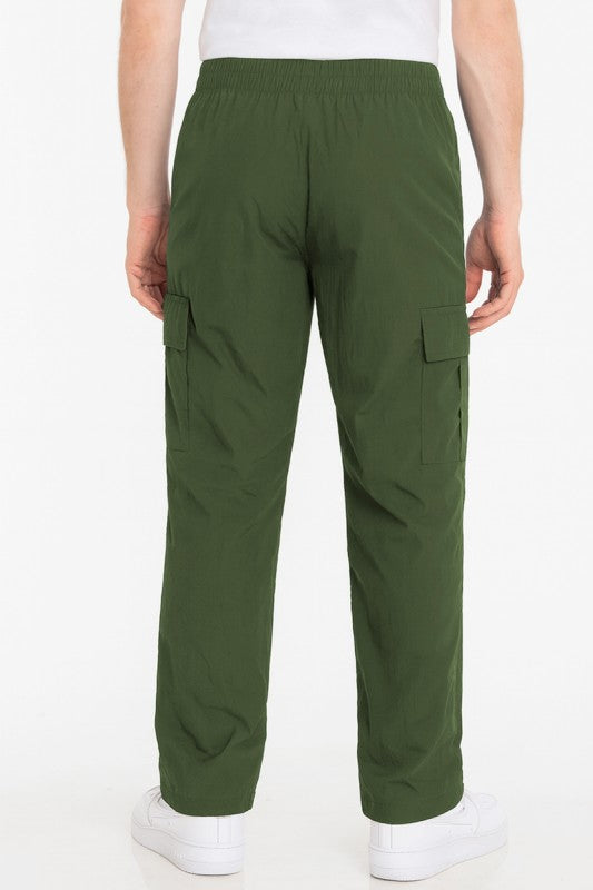 Olive nylon cargo pants with side cargo pockets and relaxed straight-leg fit