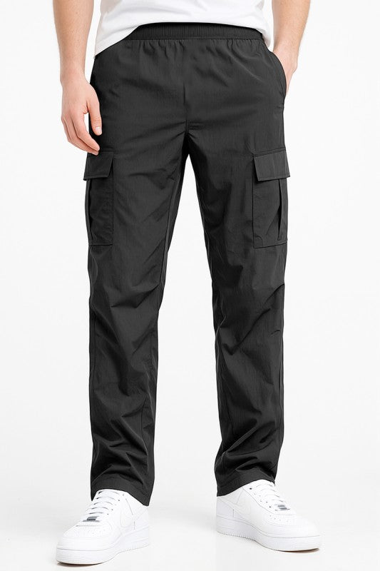 Black nylon cargo pants with cargo pockets and elastic waistband