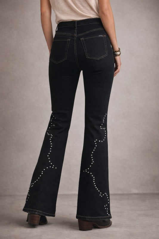 Black bootcut jeans, back view, with studded accents on the flare cuffs