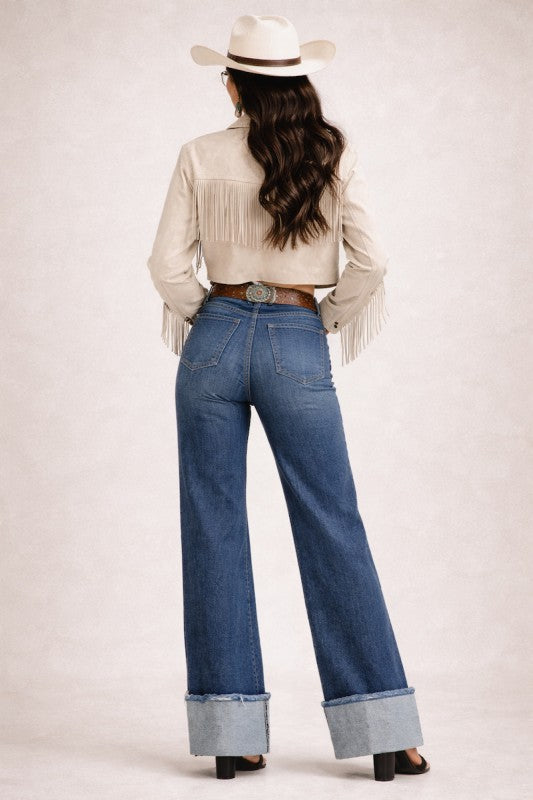 Dark wash low-rise wide-leg jeans, back view with cuffed hems